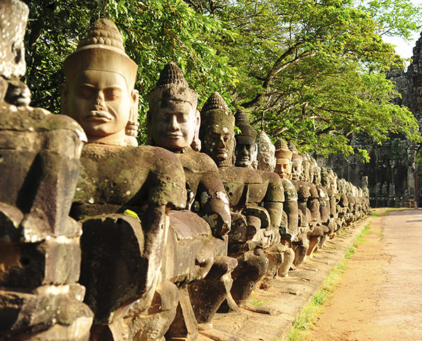 Row of Giant Statues at Front Gate of Angkor Thom City, Cambodia