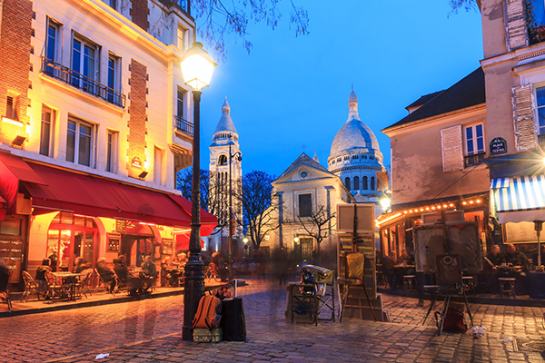 Beautiful evening view of the Place du Tertre and the Sacre-Coeur in Paris, France